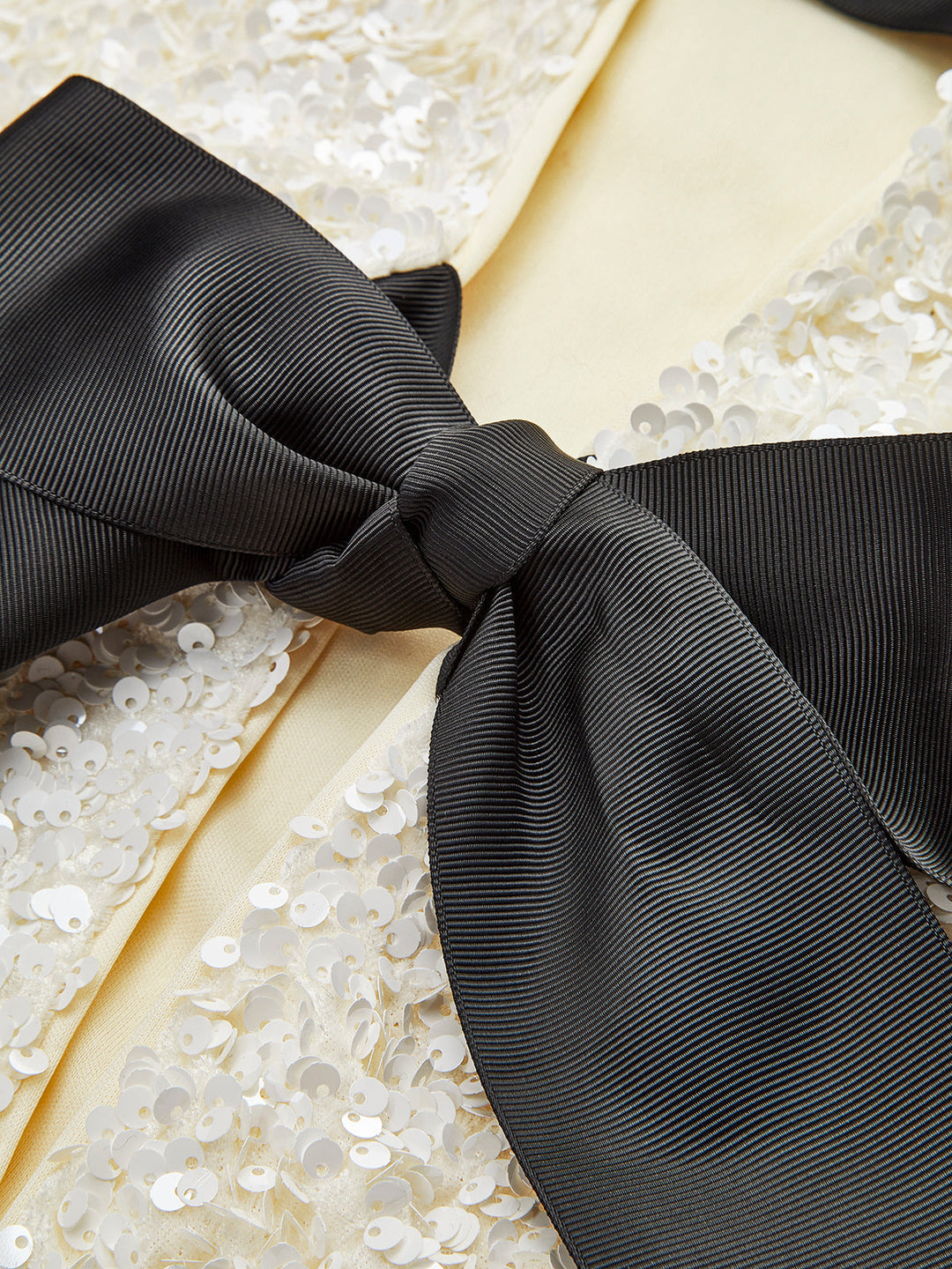 Textured Sequin Jacket with Velvet Bow Detail